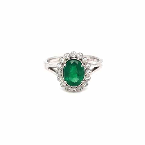 14KW Oval Emerald and Diamond Halo Ring