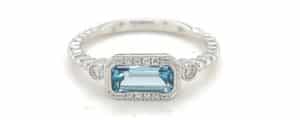 KW DIA TOPAZ EMERALD CUT RING