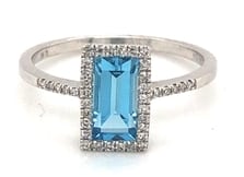 KW EMERALD CUT TOPAZ RING